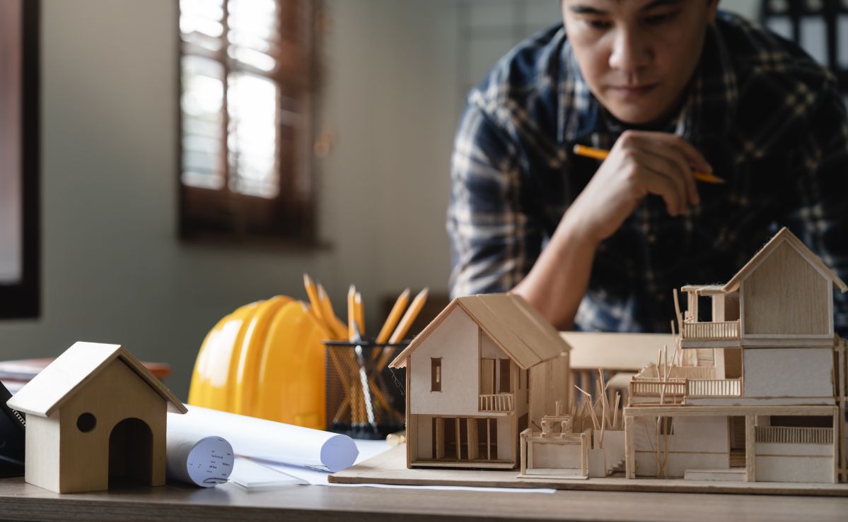 Engineer with Modern Home Construction Miniature Design